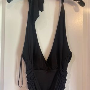 Long black halter dress. Low back. Size 4.